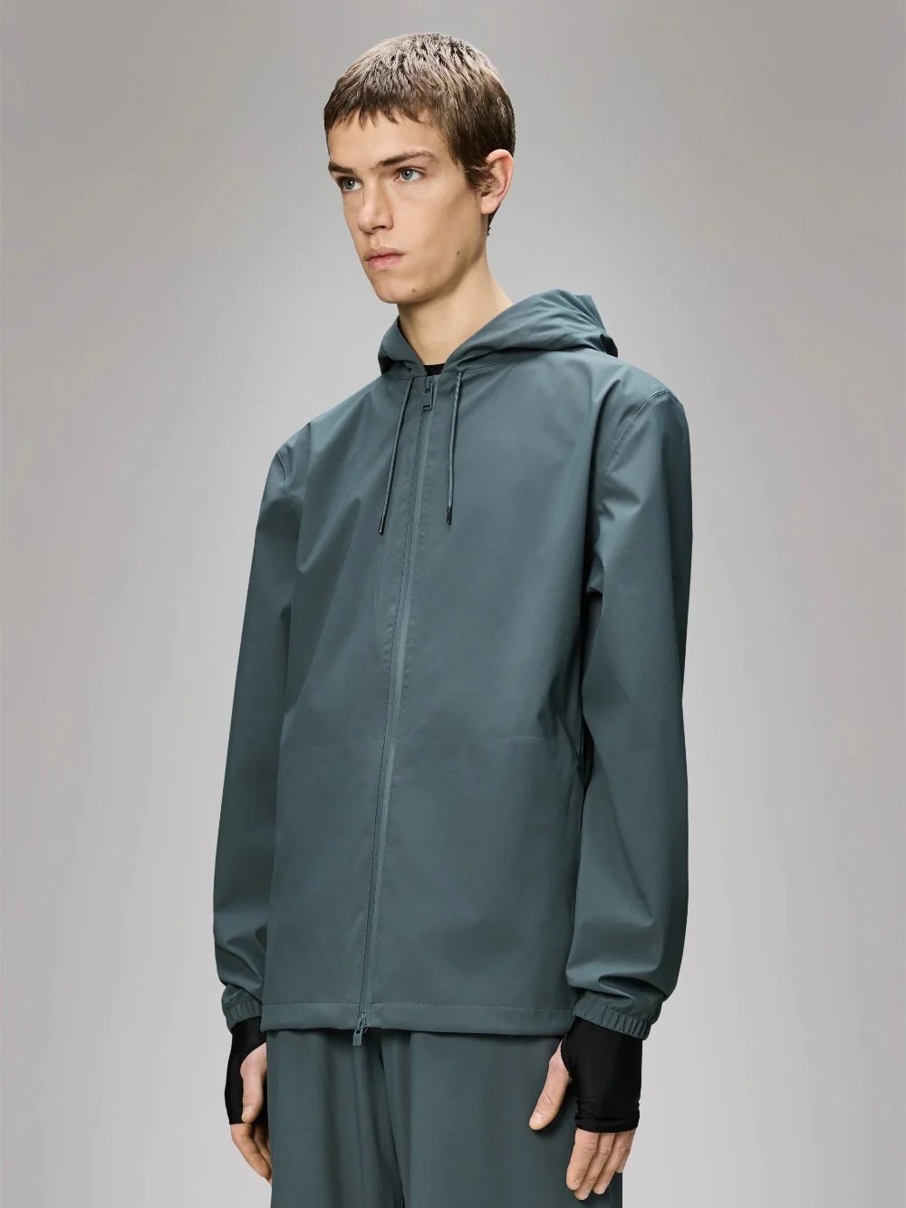 RAINS SUVA HARDSHELL JACKET LAGOON 